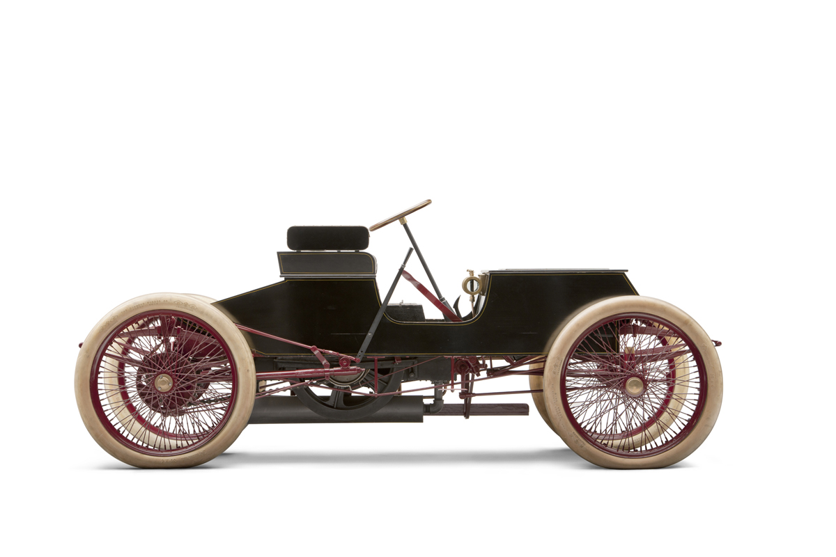 Side view of very basic open automobile