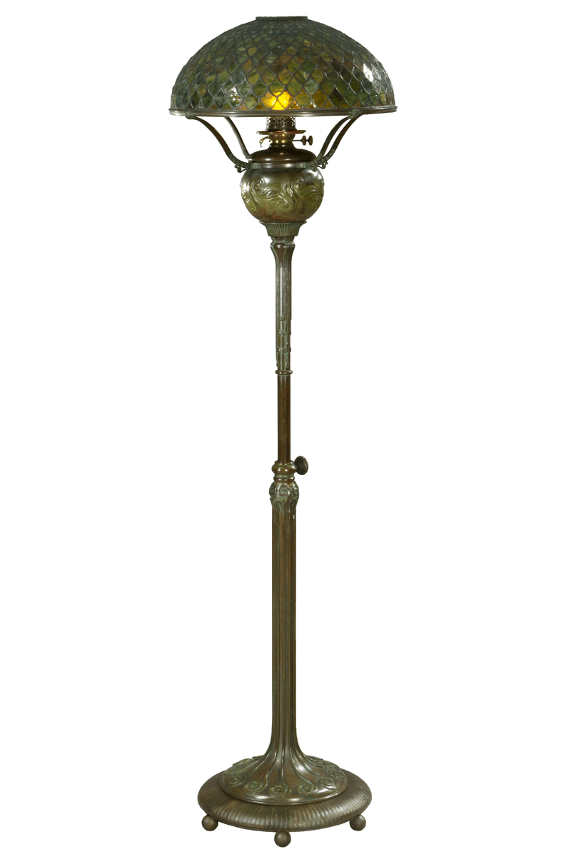 GIF that cycles through several images and detail shots of a bronze floor lamp with bronze and glass shade. 