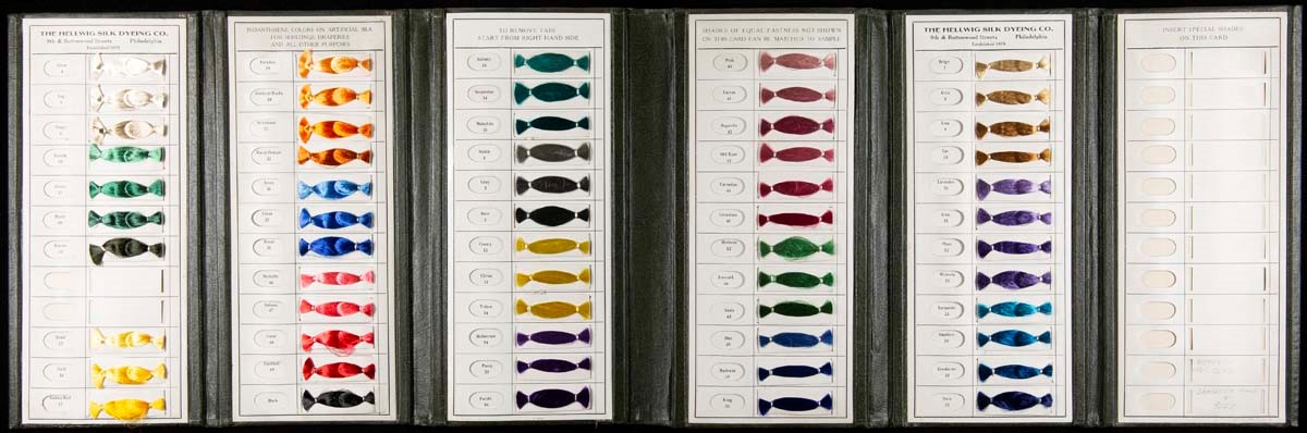 ¬Rows of fiber or thread samples in a variety of colors accompanied by text
