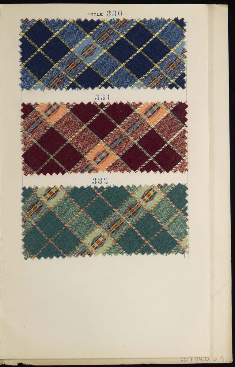 Page containing three plaid fabric swatches in blue, brown, and green