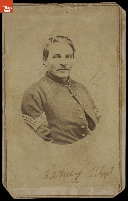 Portrait of Barney Litogot, 24th Michigan Volunteer Infantry, Company K, 1865 Matted, oval, black-and-white photograph of man in military uniform