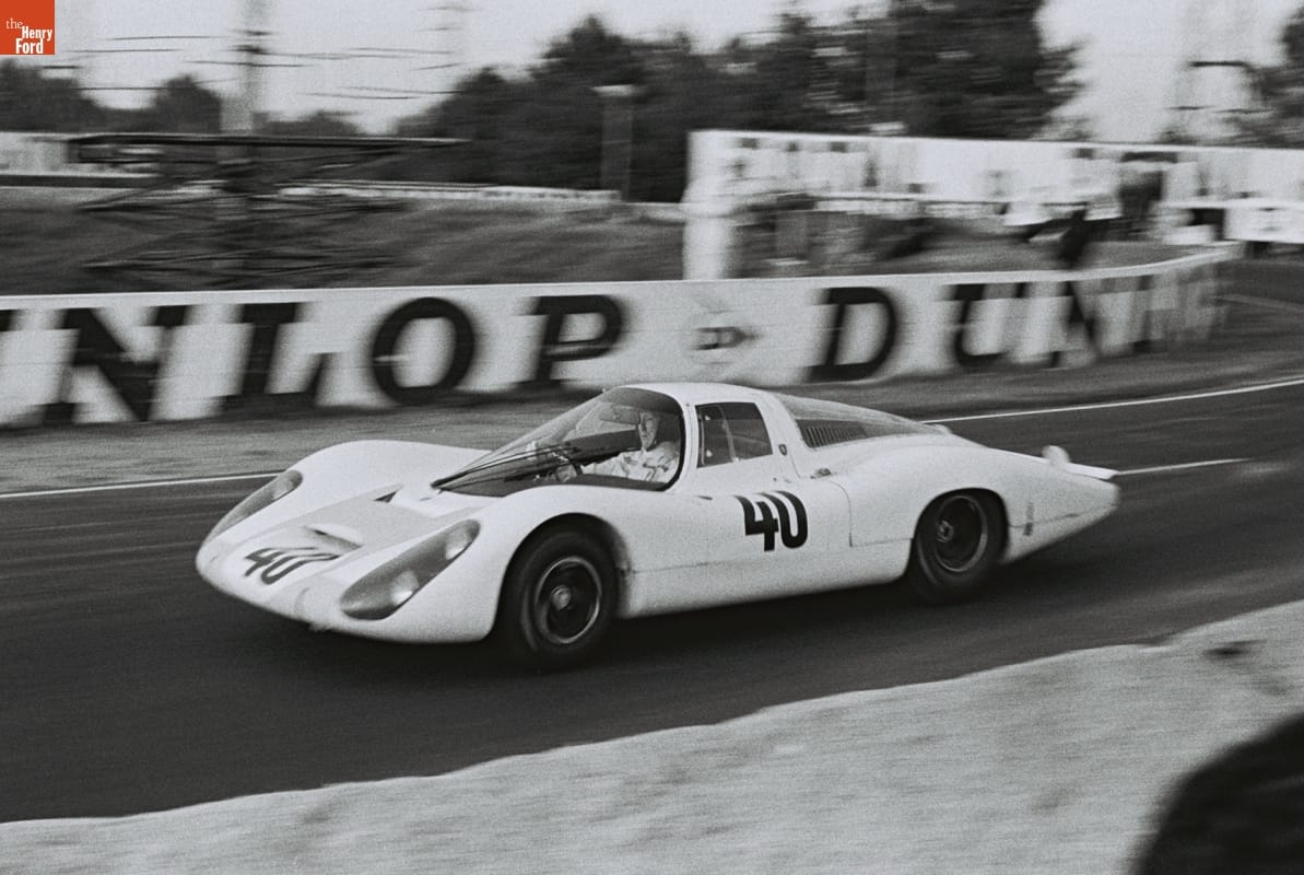 Low race car with number "40" on side on race track