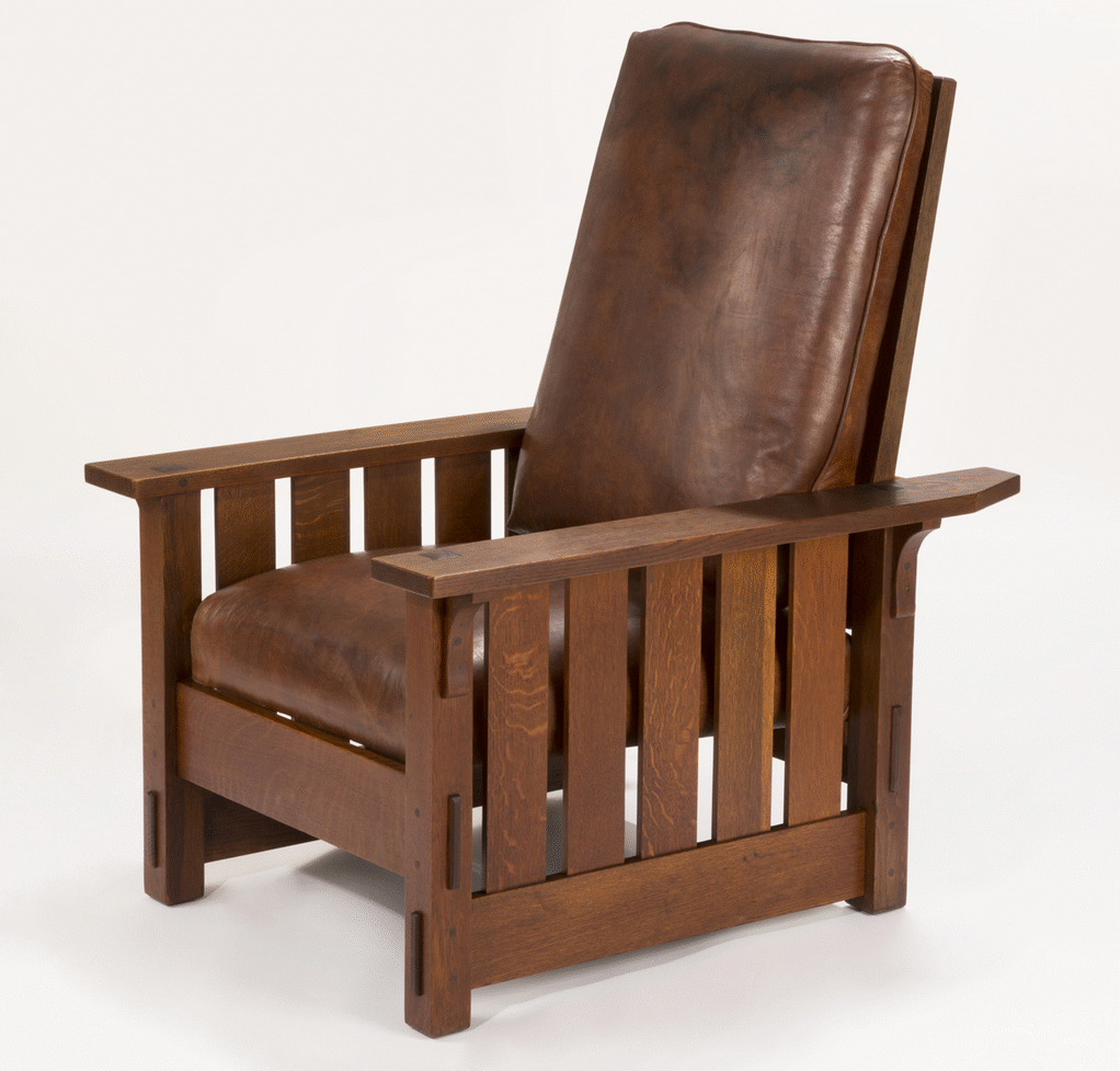 Chair with brown leather cushions and wooden slats on either side