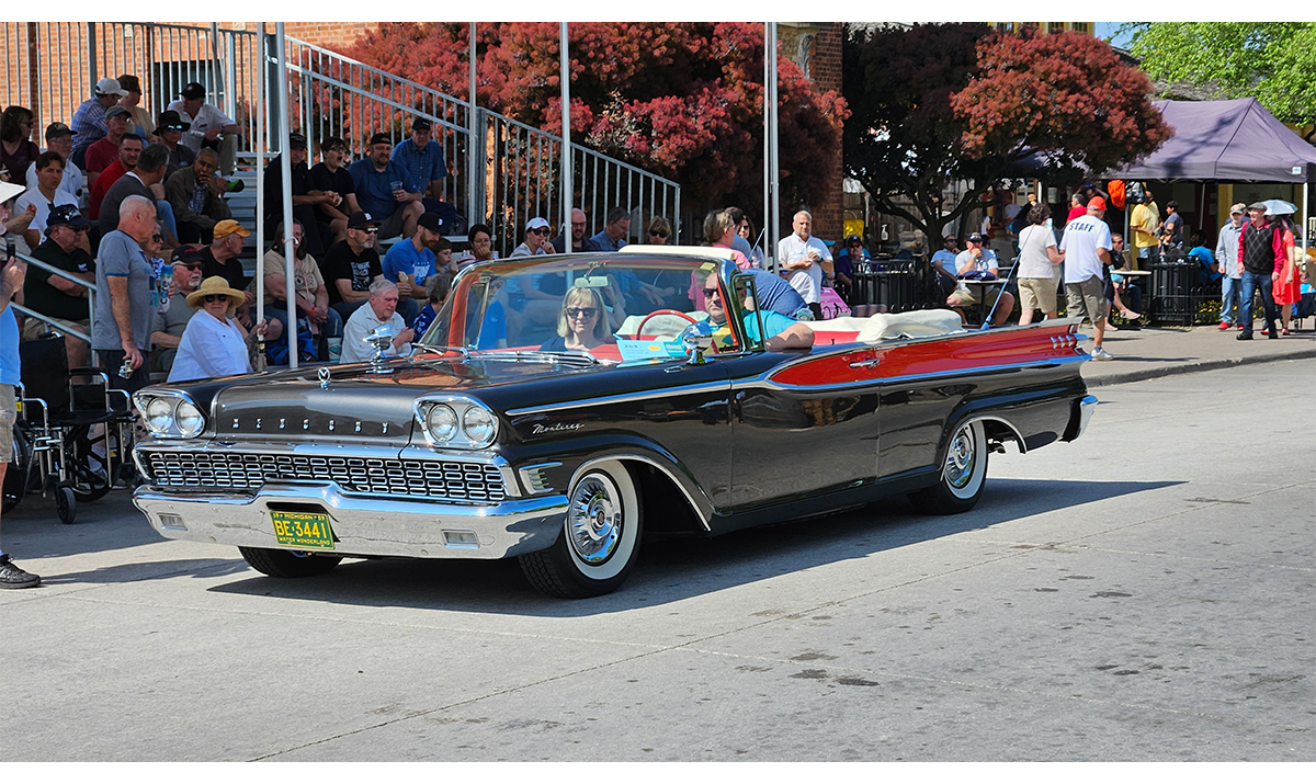 Pass-in-review programs shared some of the history behind participating cars, like this 1959 Mercury Monterey. / Image by Matt Anderson