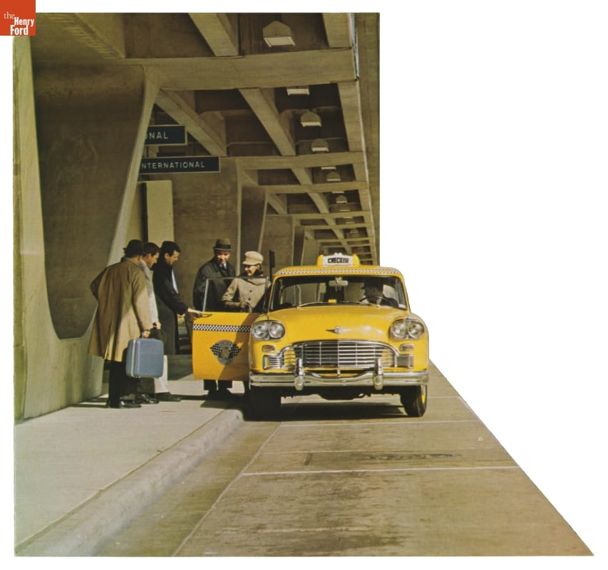 People under an elevated overpass or roadway entering yellow taxicab