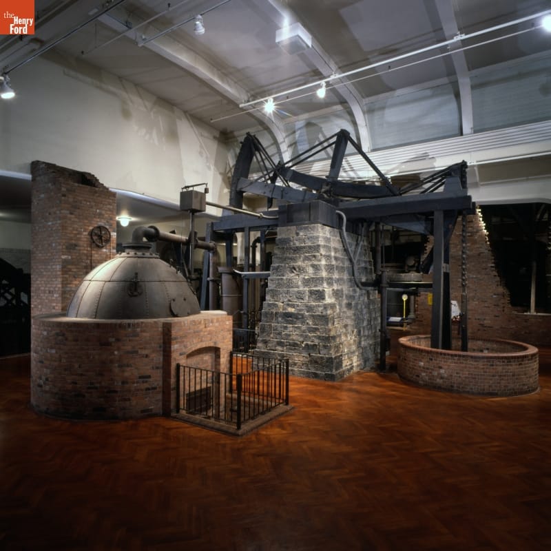 Brick, wood, and stone apparatus in large room