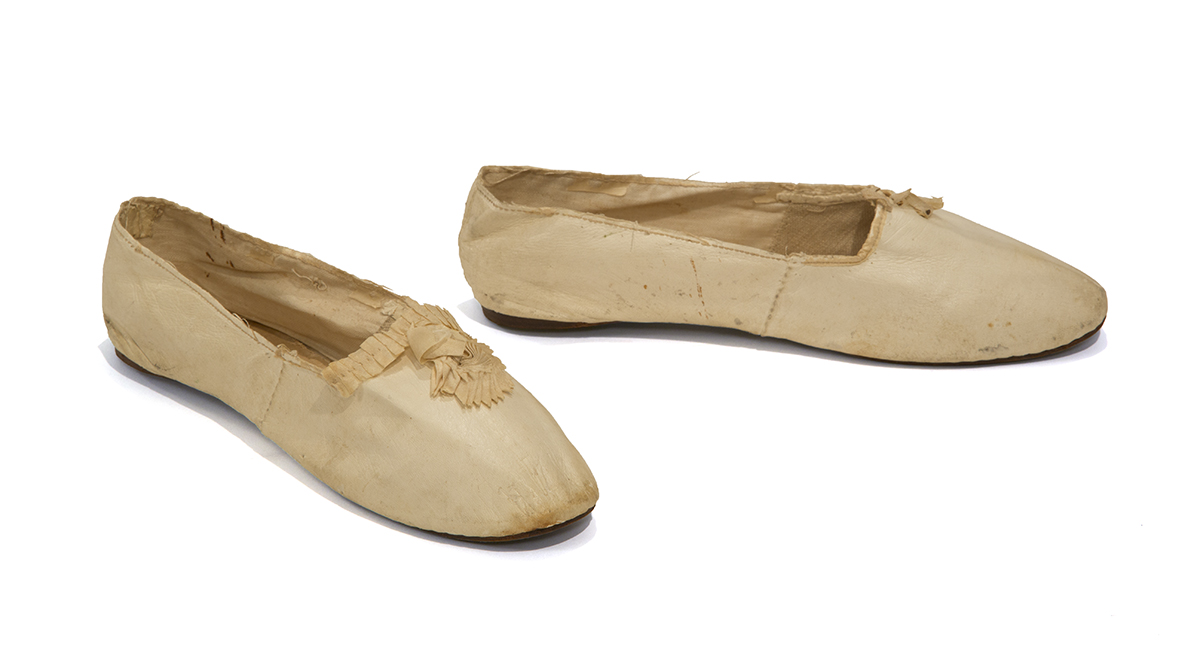 Women's Slippers, circa 1830 Pink fabric slippers with small ruffle on top of body