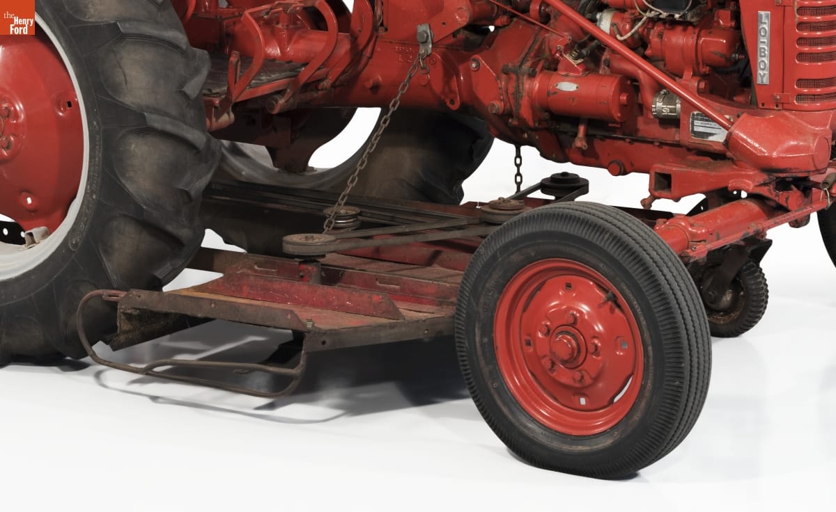 Prototype Lawn Mower, Designed by Norman Swanson, circa 1956 Close-up of red metal plate mounted beneath red tractor