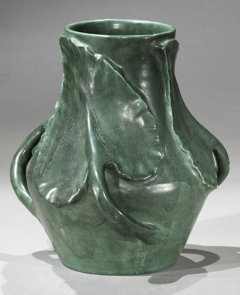 Green vase with swirling 3D leaf design