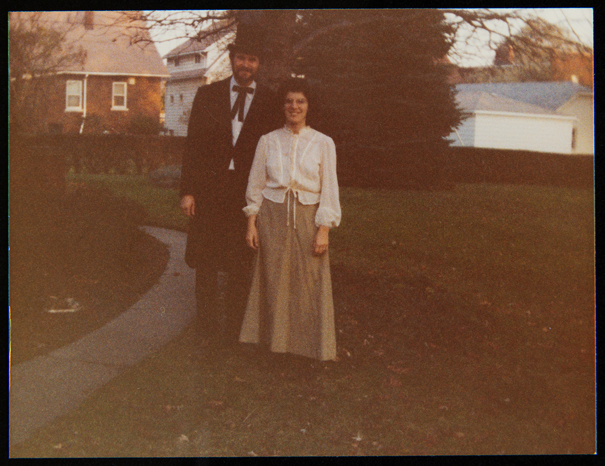 Curt and Donna Braden Dressed for Halloween, 1981 Man and woman standing outside with trees and houses behind them