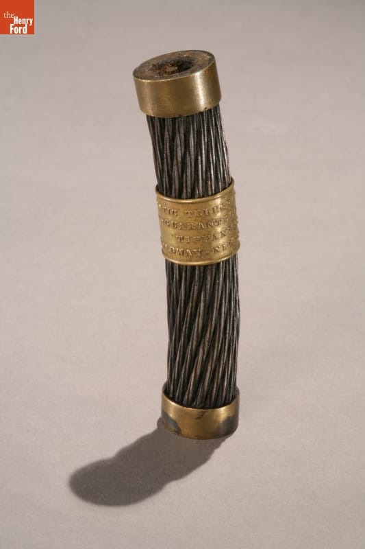 Twisted wires stranded together and banded on both ends and in the middle with brass